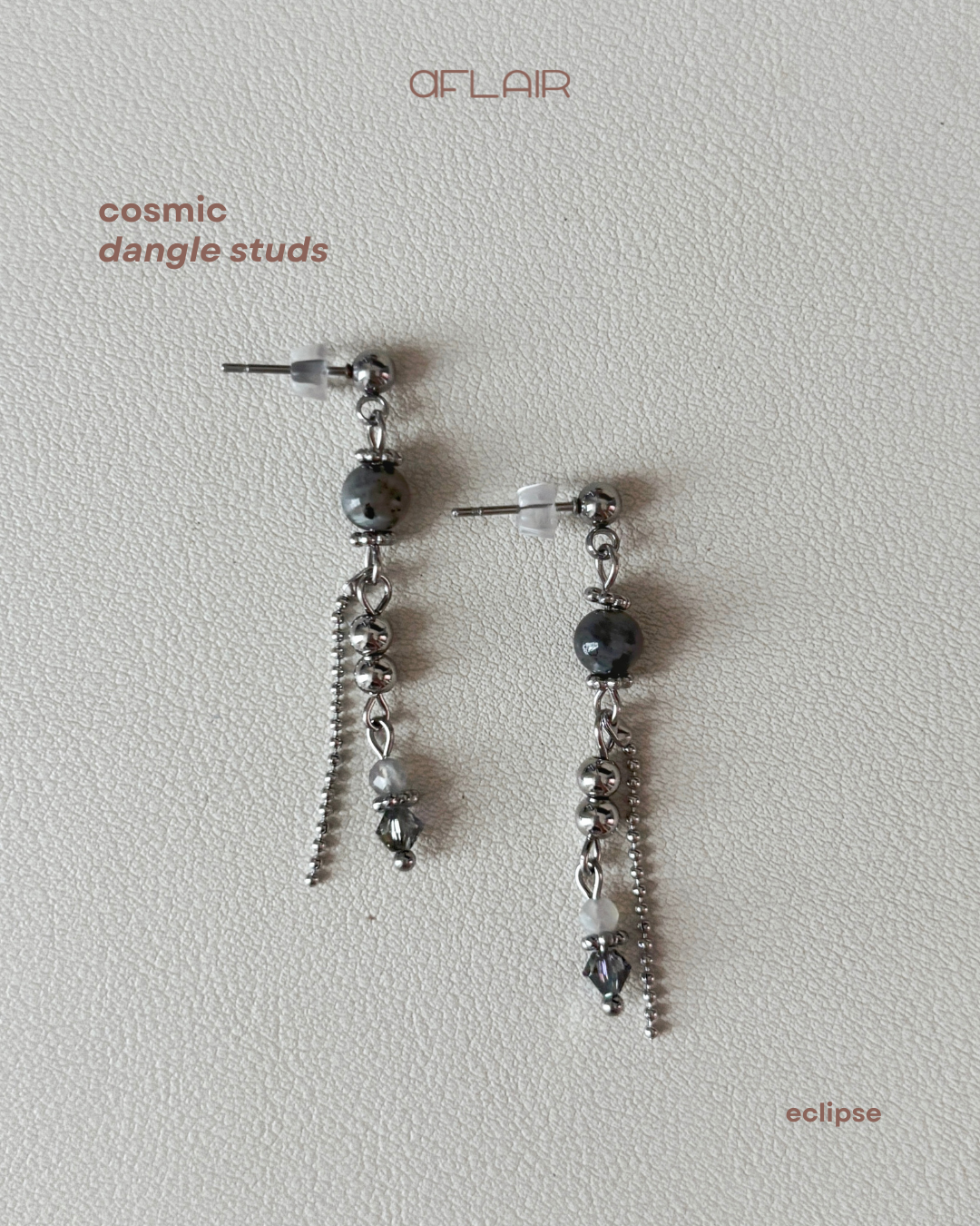 cosmic dangle studs