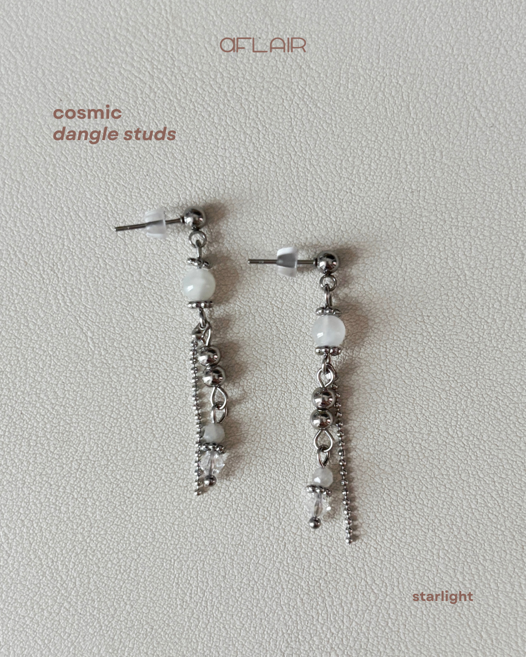 cosmic dangle studs